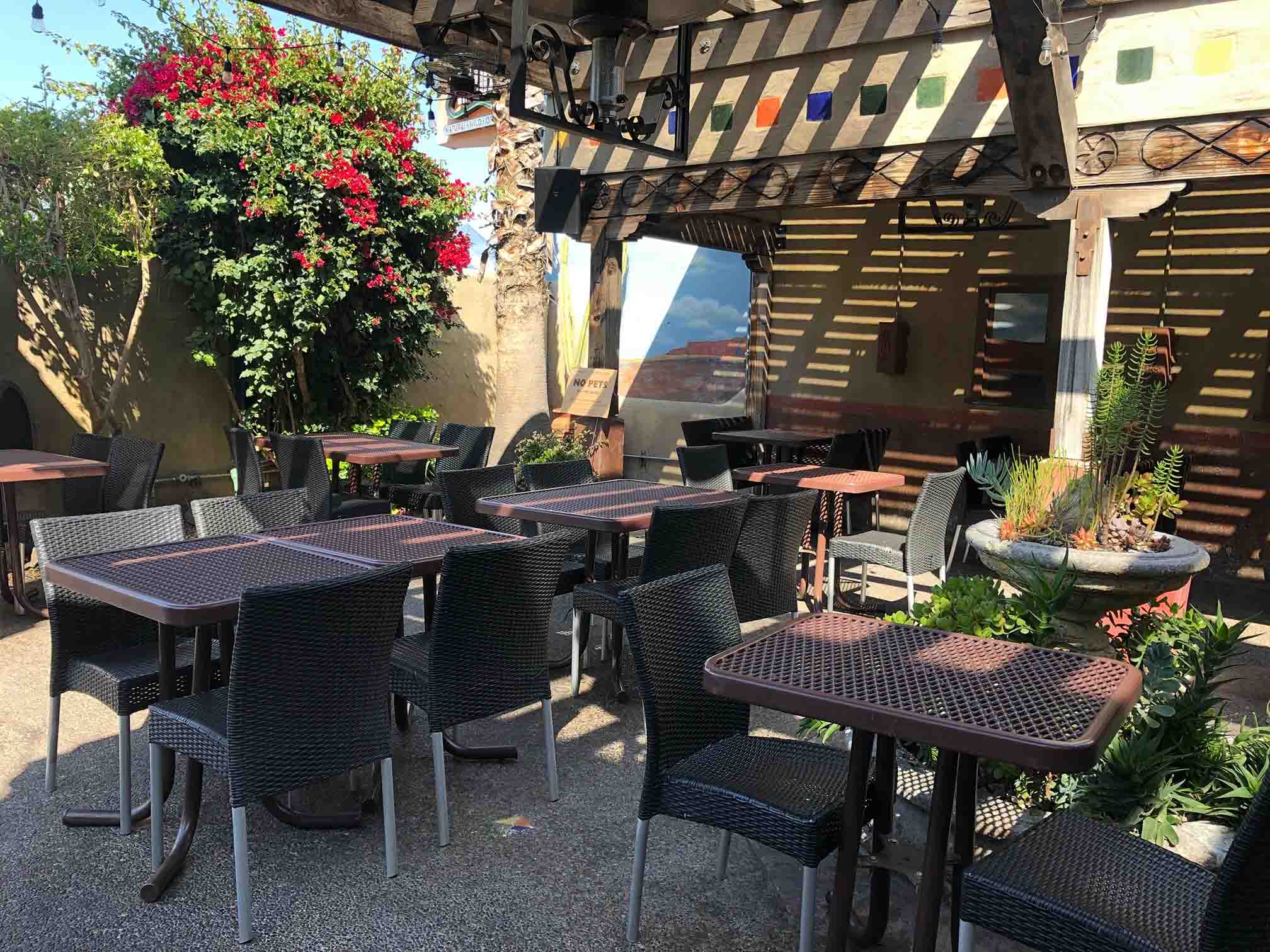 Our outdoor covered patio at Aqui in downtown Willow Glen. with our patio tables and chairs.