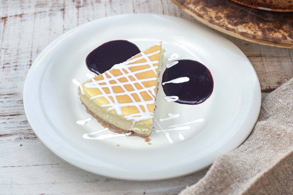 Lemon Cheesecake with Blackberry Sauce and Sour Cream
